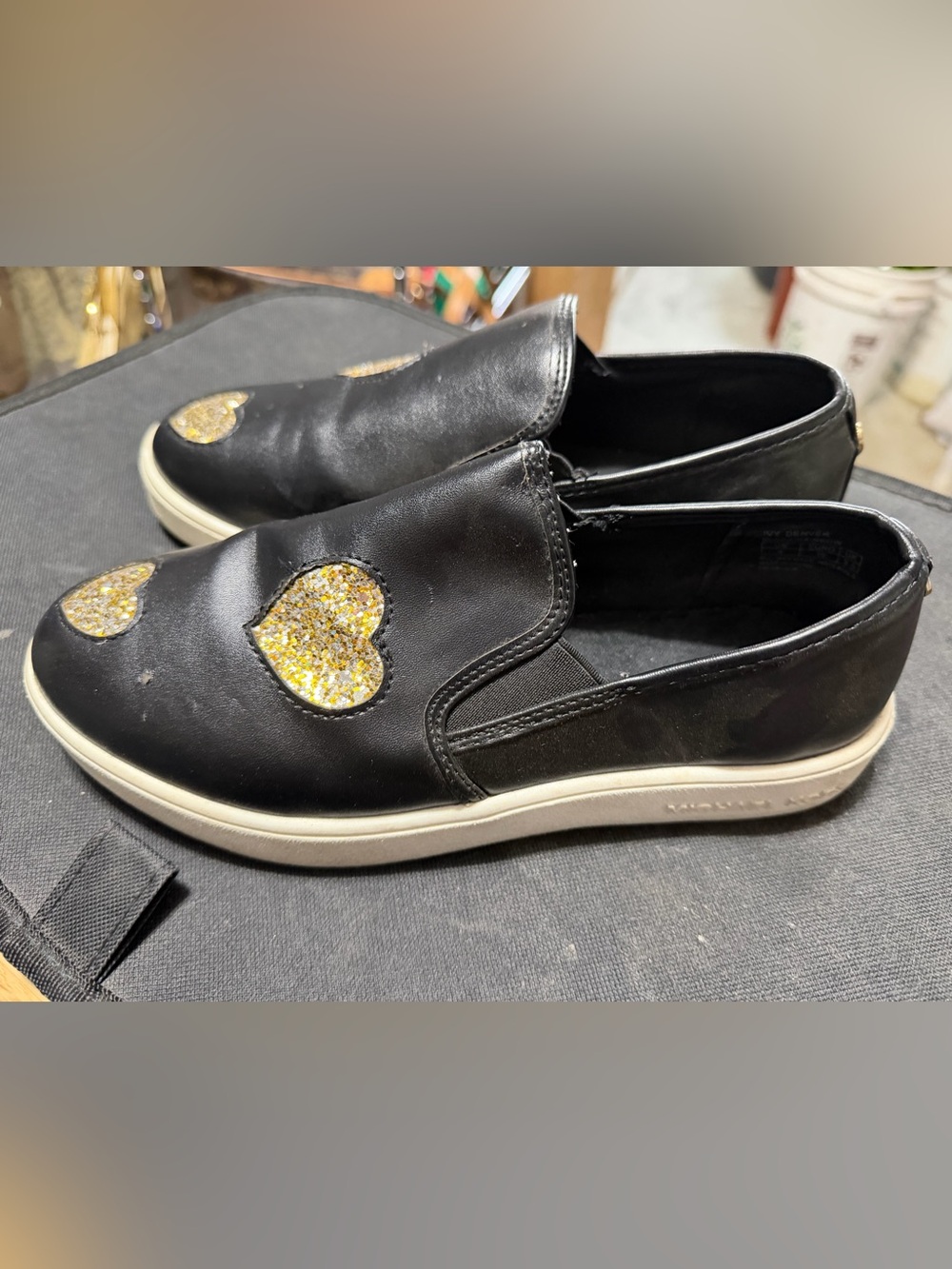 Michael Kors Black Slip-On Sneakers with Gold Glitter Hearts